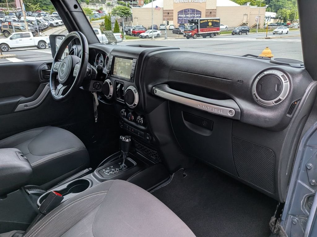 Used 2016 Black Jeep Unlimited Sahara image 21