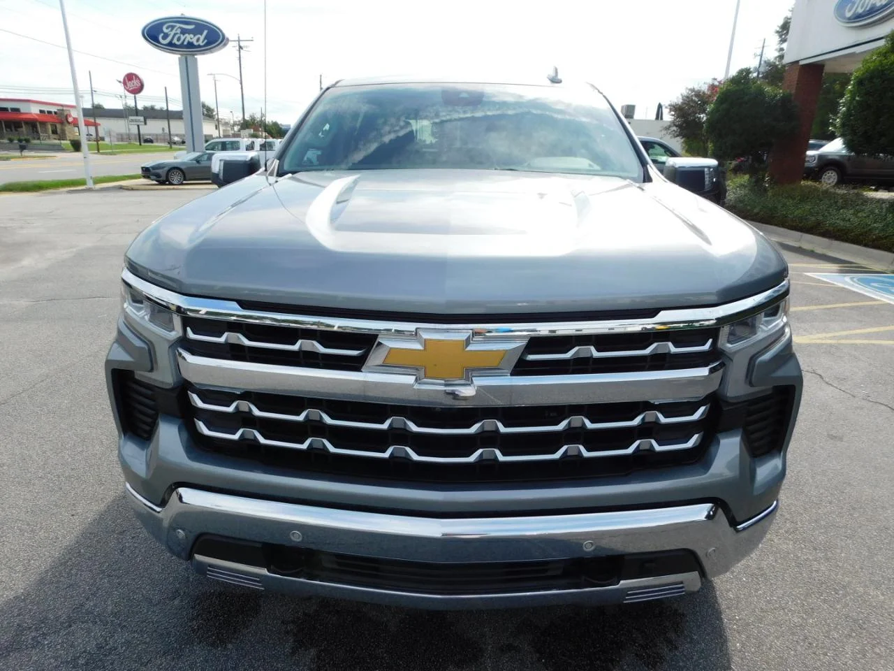 Used 2023 Silver Chevrolet 4WD CREW CAB 147 in LTZ image 3