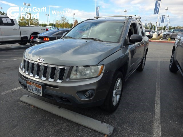 Used 2011 Mineral Gray Metallic Jeep Base image 1