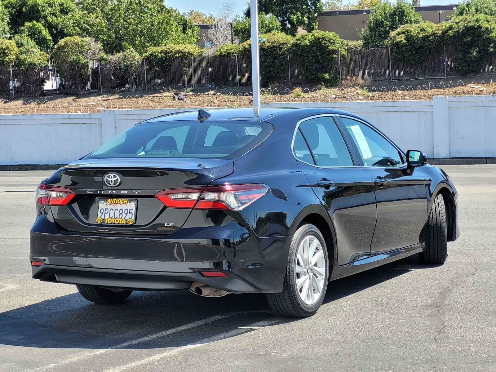 Used 2024 Black Toyota LE image 4