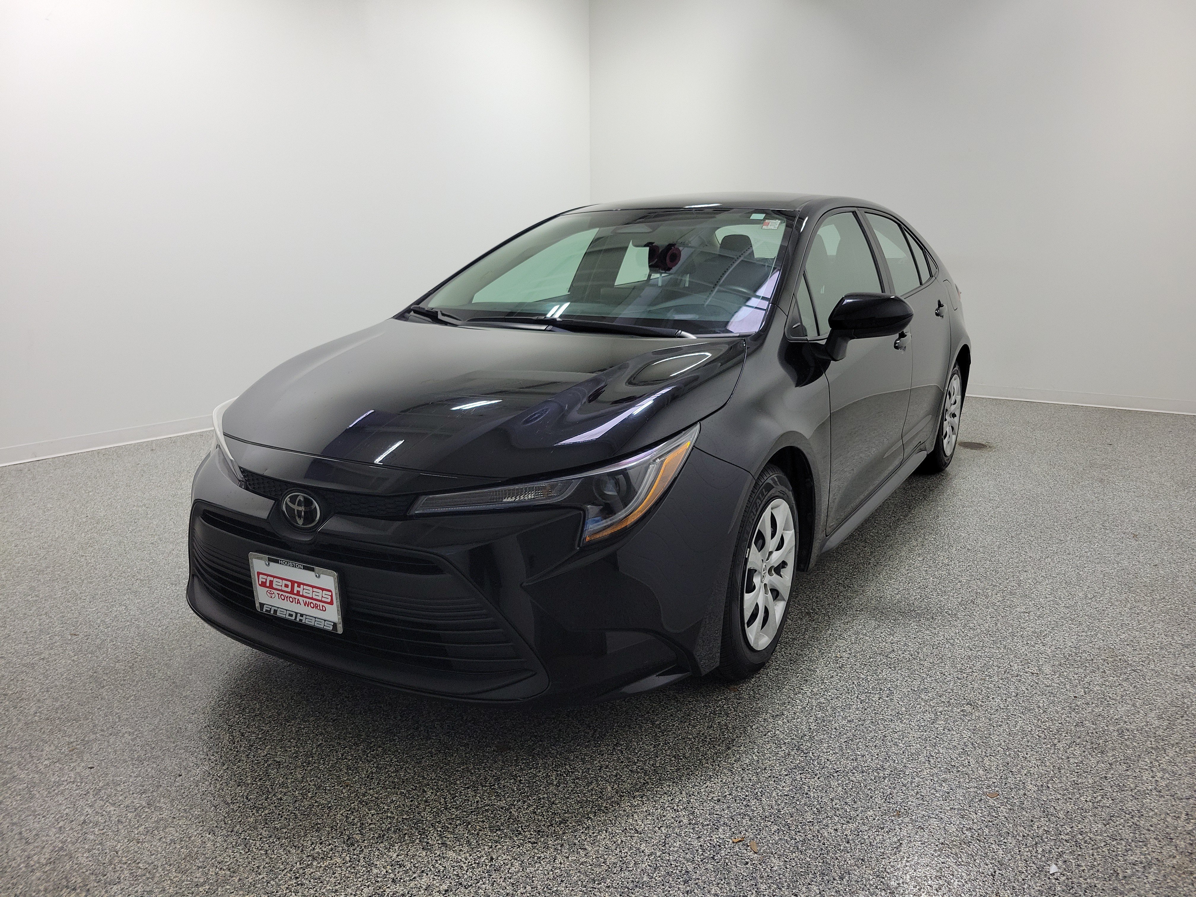 Used 2024 Black Toyota LE image 2
