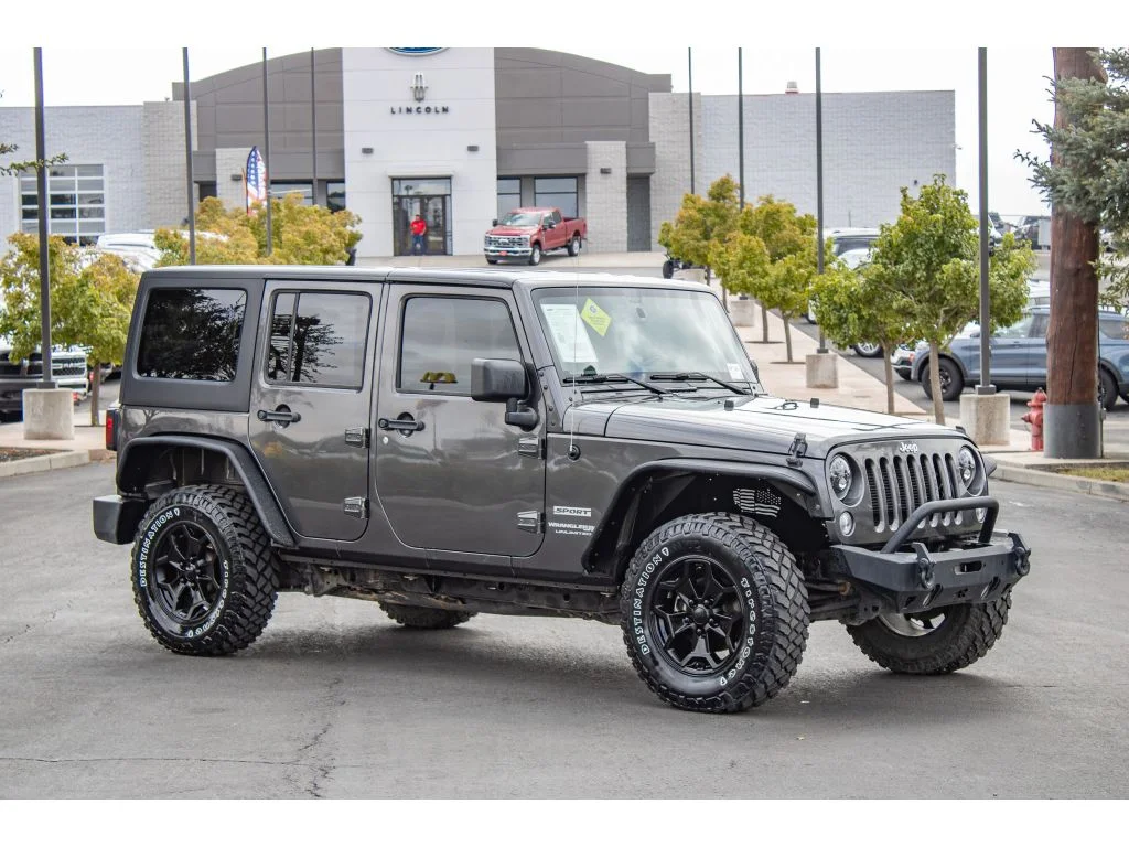 Used 2018 Granite Crystal Metallic Clearcoat Jeep Sport S image 2