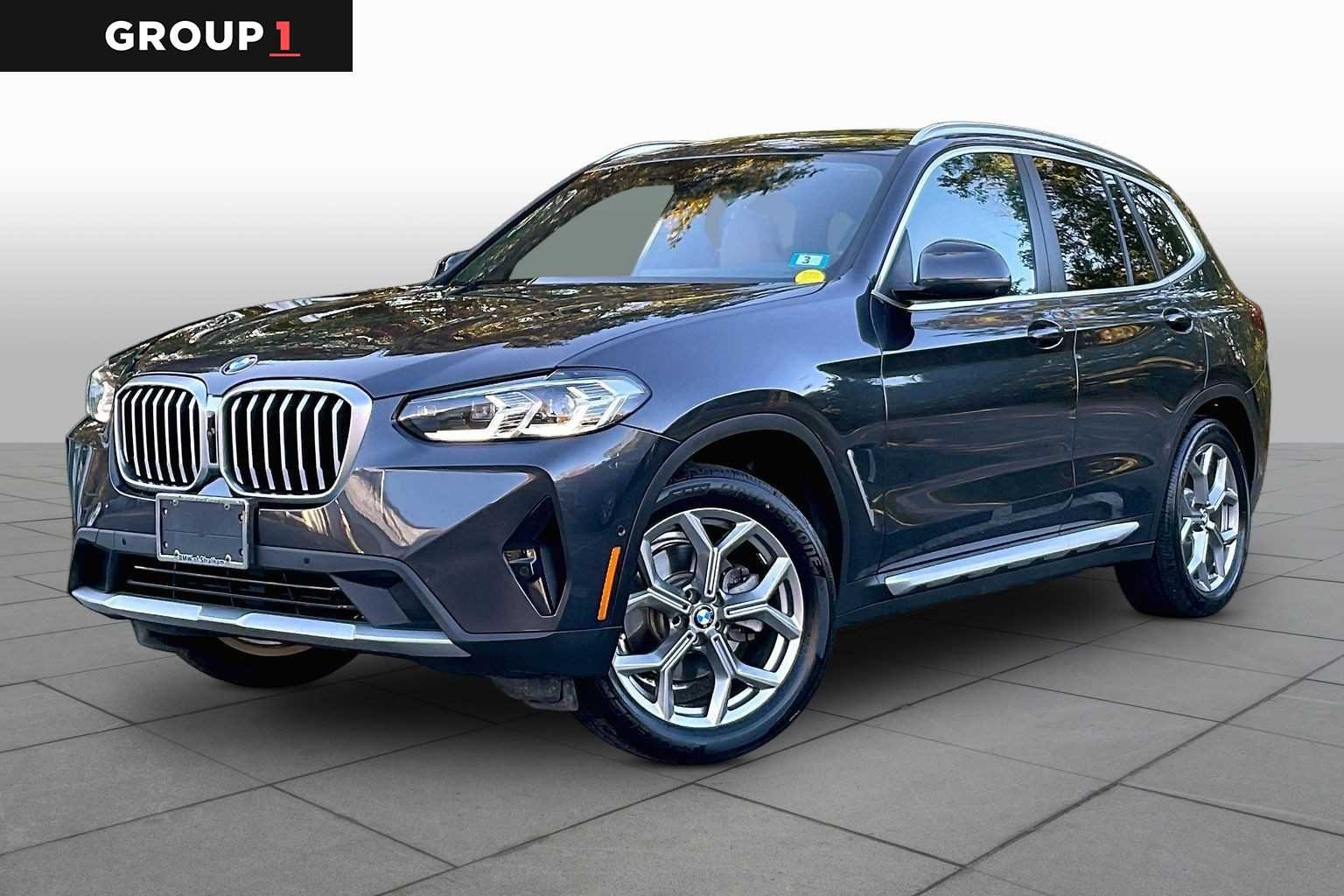 Used 2024 Dark Graphite Metallic BMW xDrive30i image 1