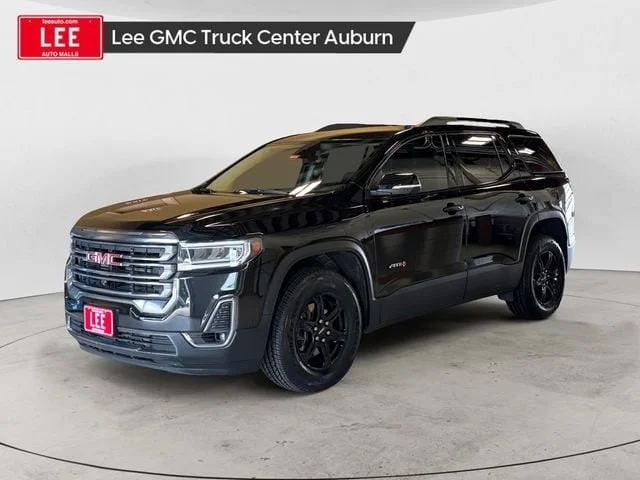 Used 2023 Ebony Twilight Metallic GMC AT4 image 1