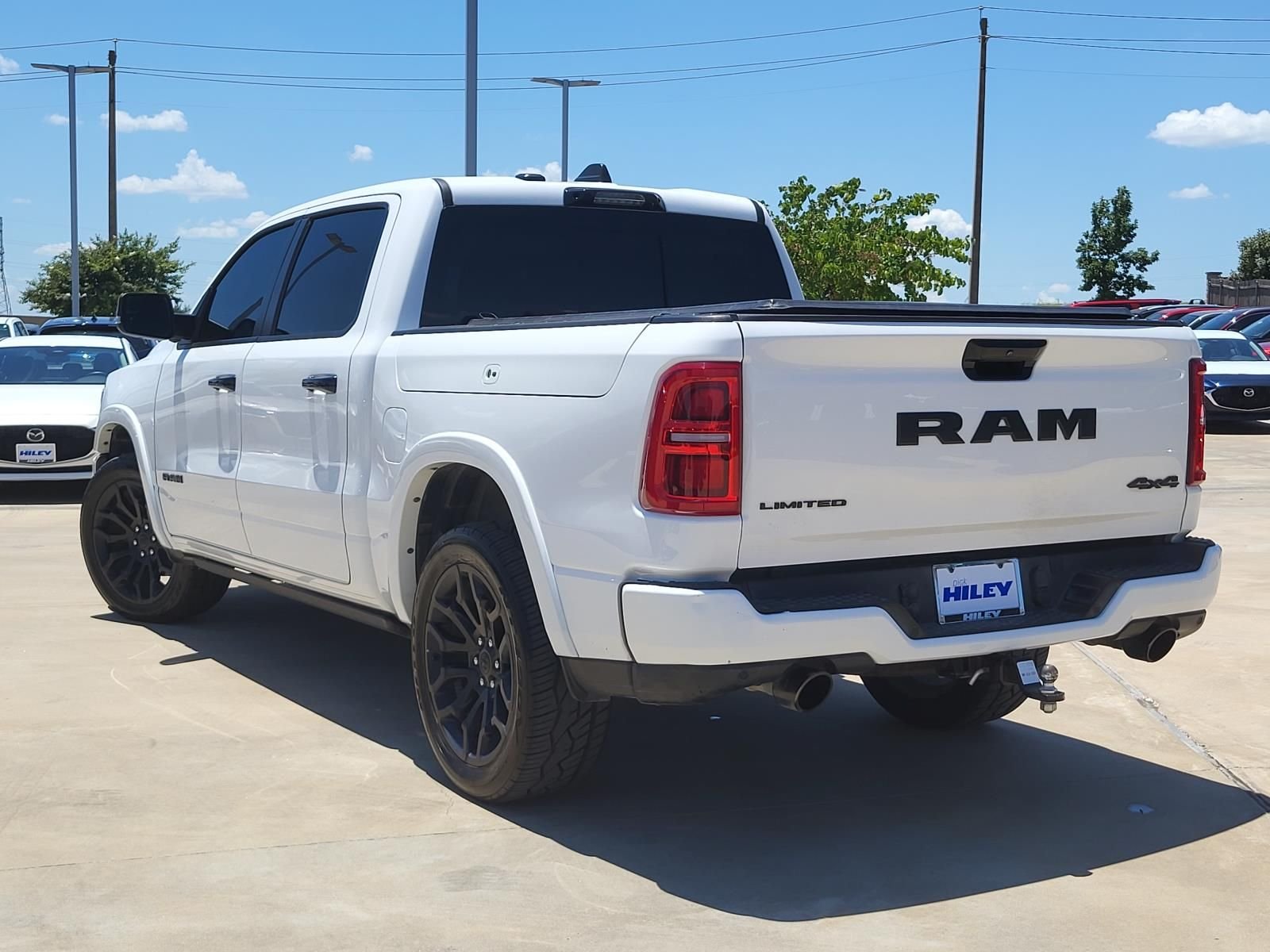 Used 2025 Bright White Clearcoat Ram Limited image 4