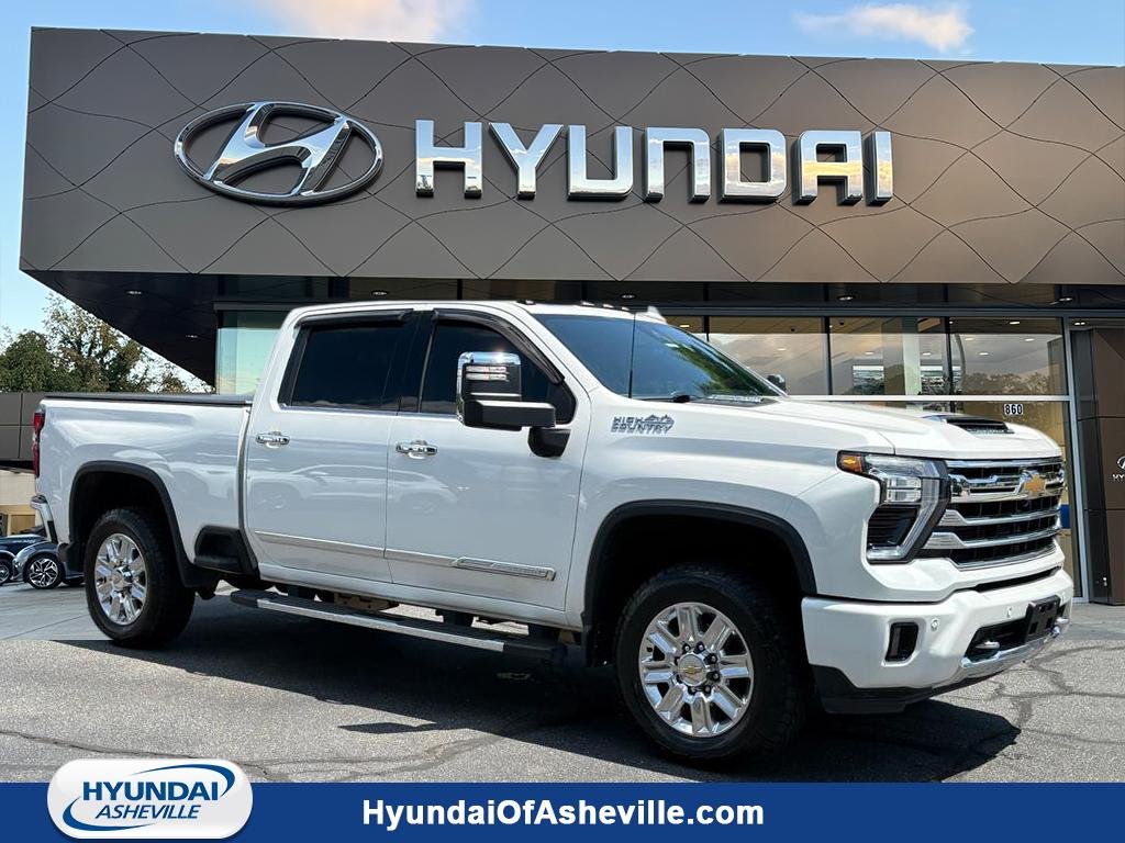 Used 2025 Summit White Chevrolet High Country image 1