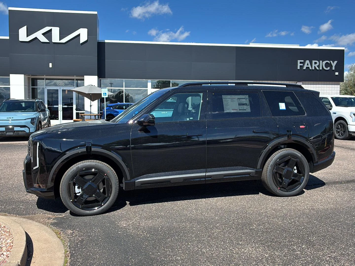 New 2027 Ebony Black Kia X-Line EX image 1