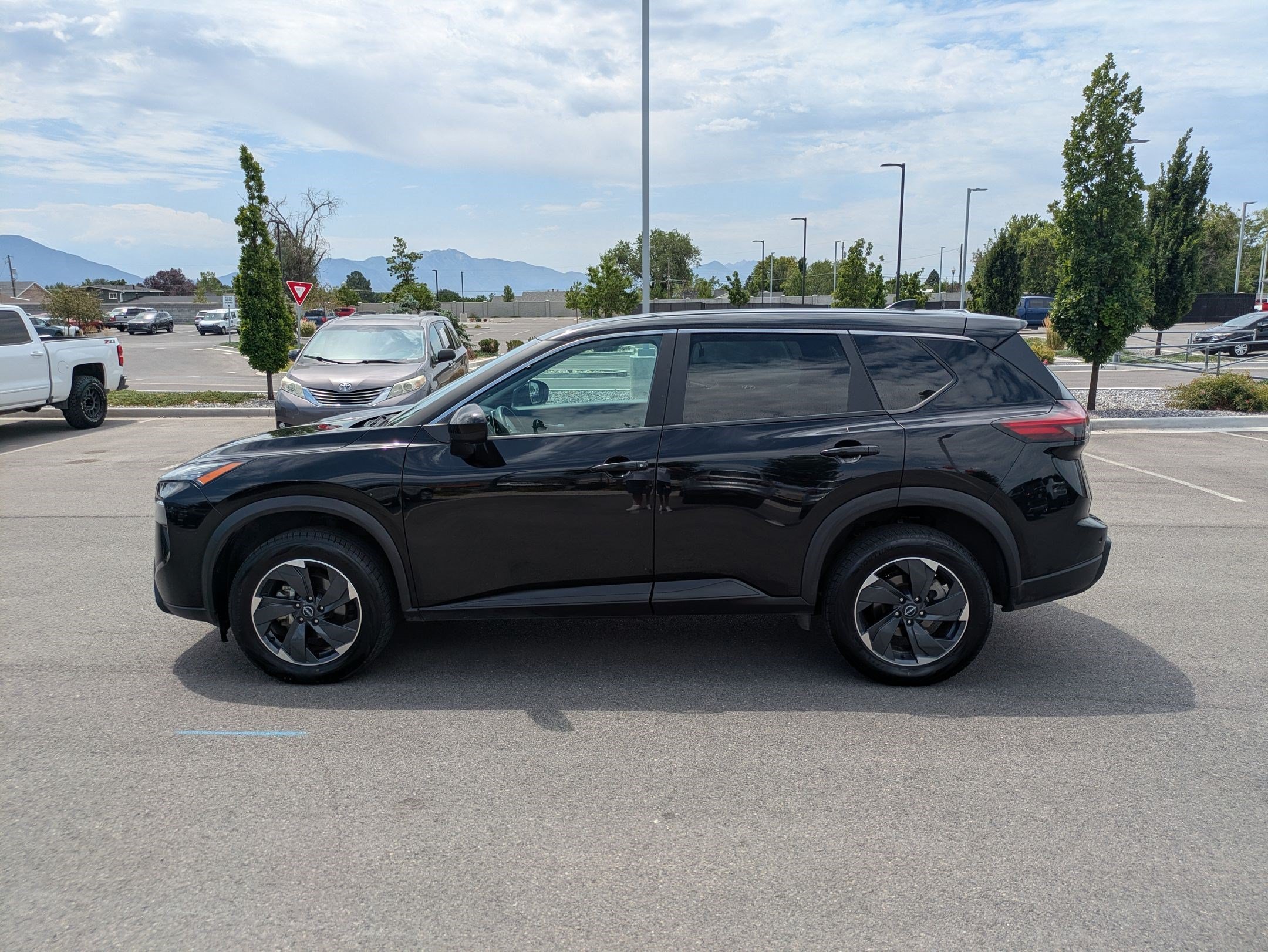 Used 2024 Super Black Nissan SV image 7