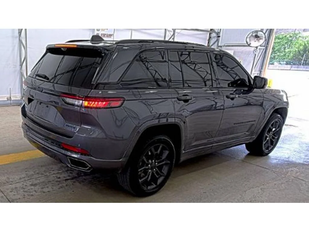 Used 2023 Gray Metallic Jeep 4xe image 4
