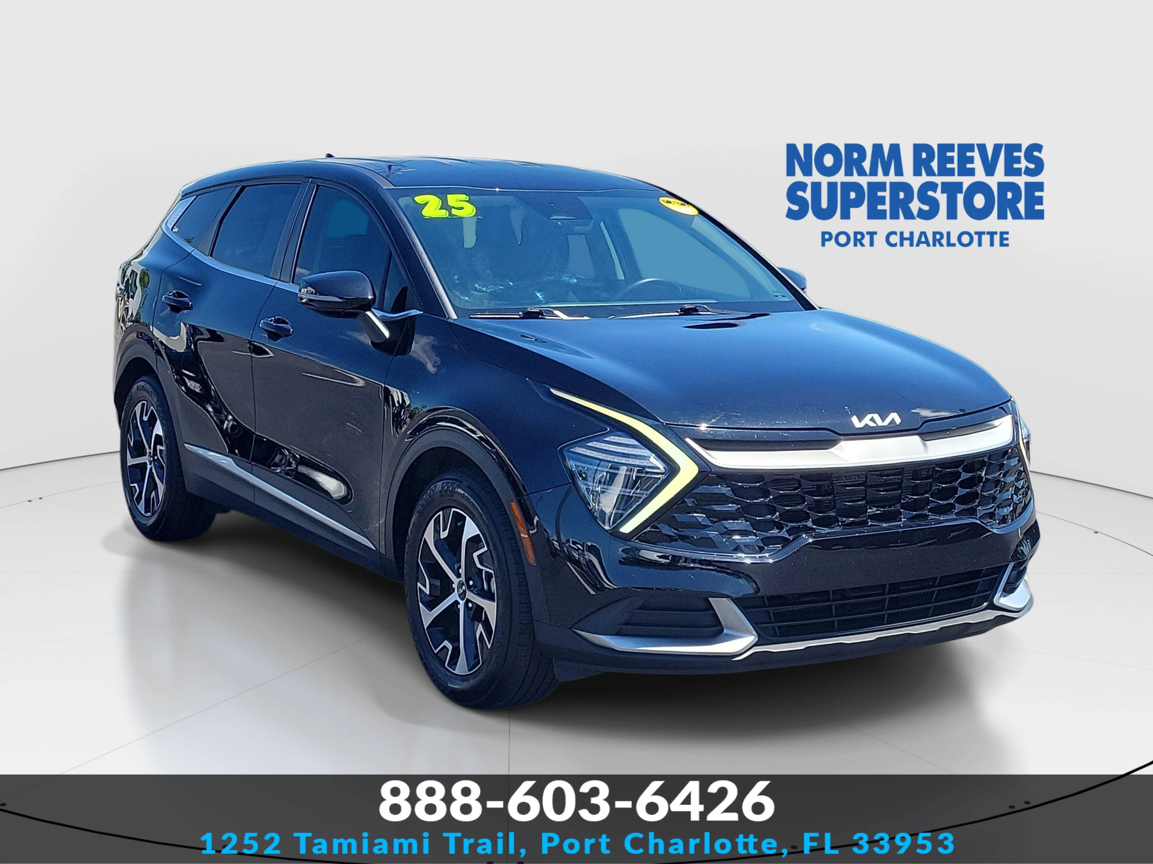 Used 2025 Ebony Black Kia EX image 1