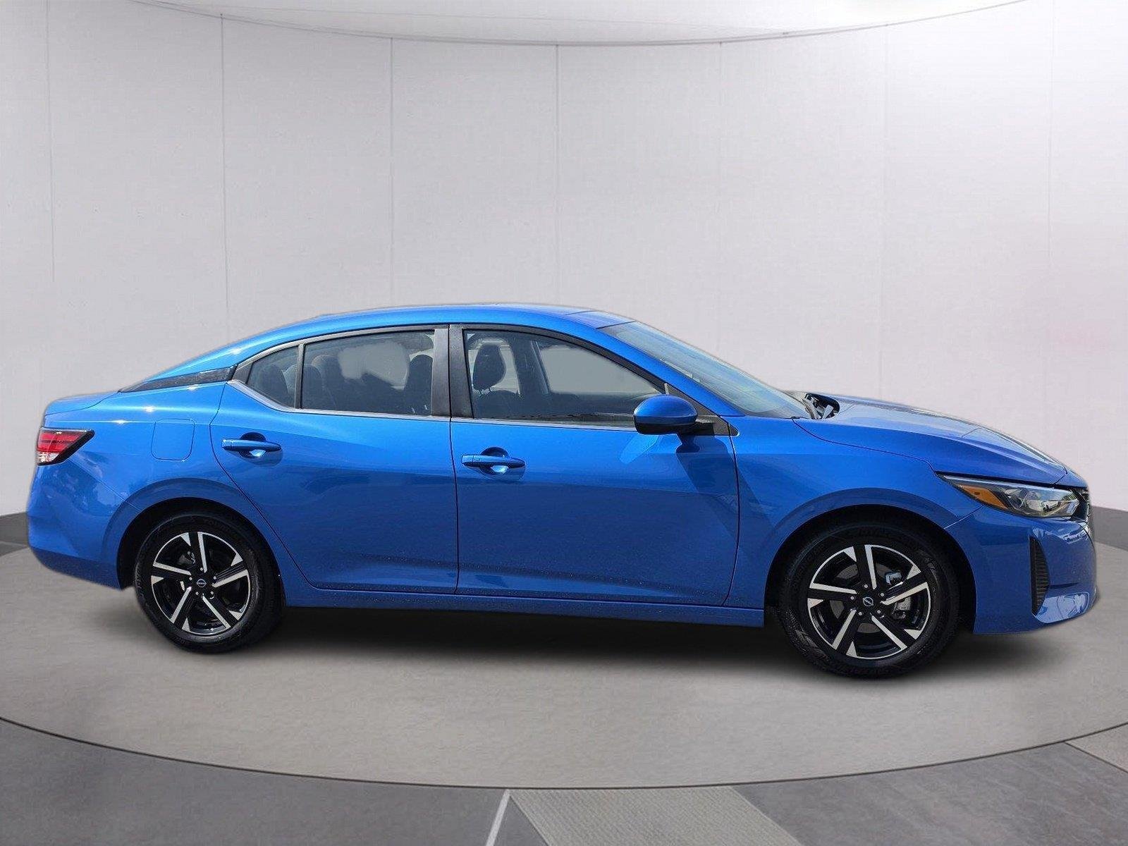 Used 2025 Electric Blue Metallic Nissan SV image 6