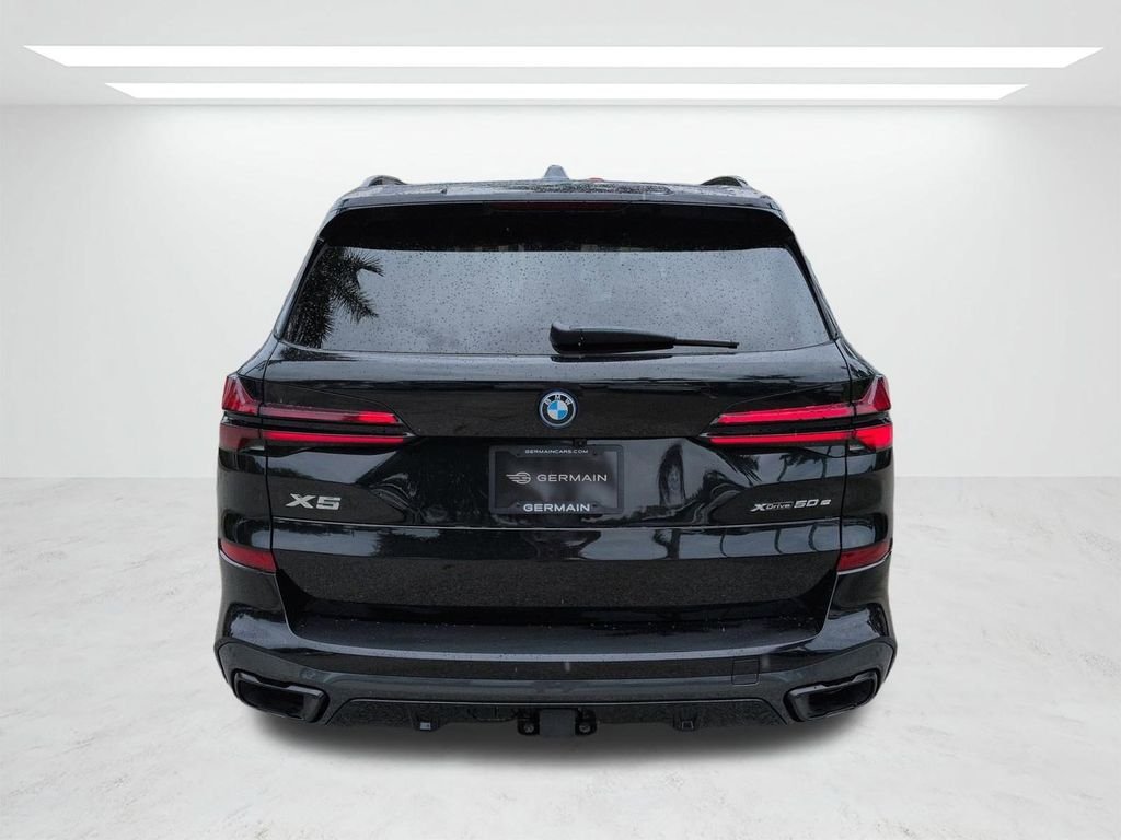 New 2026 Black Sapphire Metallic BMW xDrive50e image 5