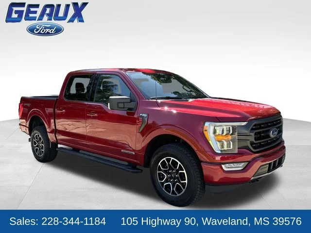 Used 2021 Rapid Red Metallic Tinted Clearcoat Ford XLT image 1