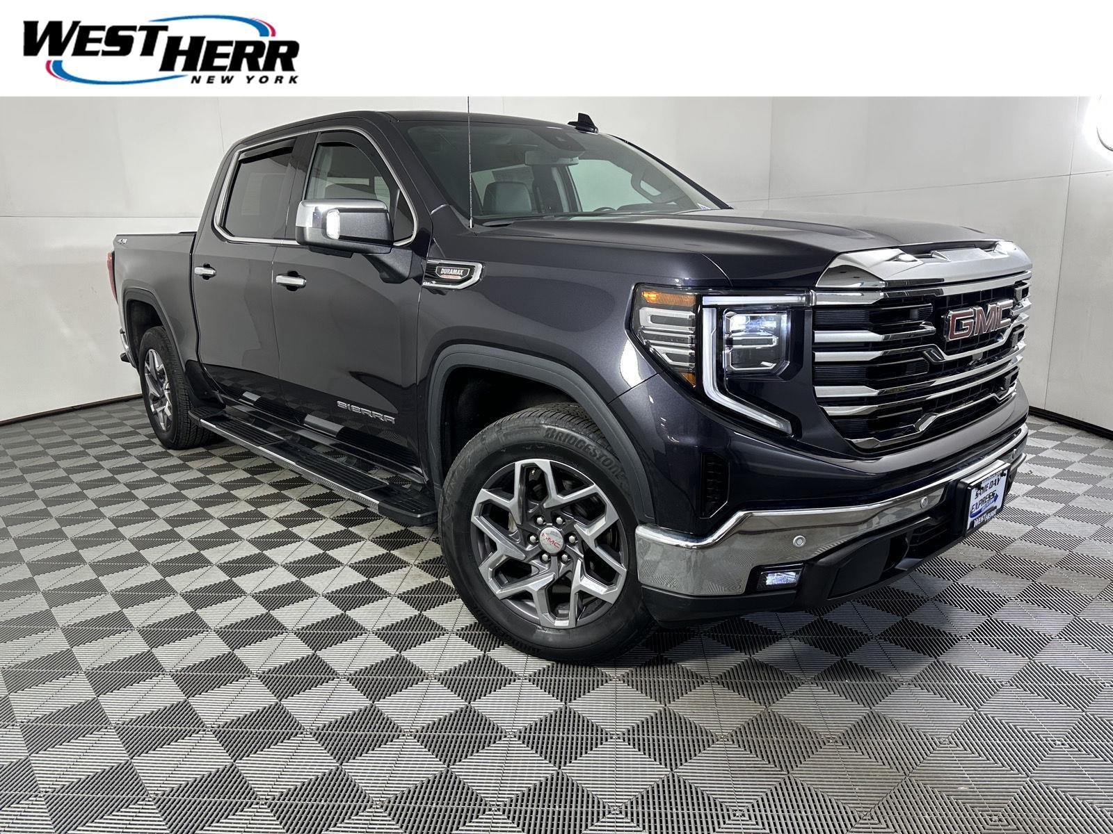 Used 2024 Titanium Rush Metallic GMC SLT image 1