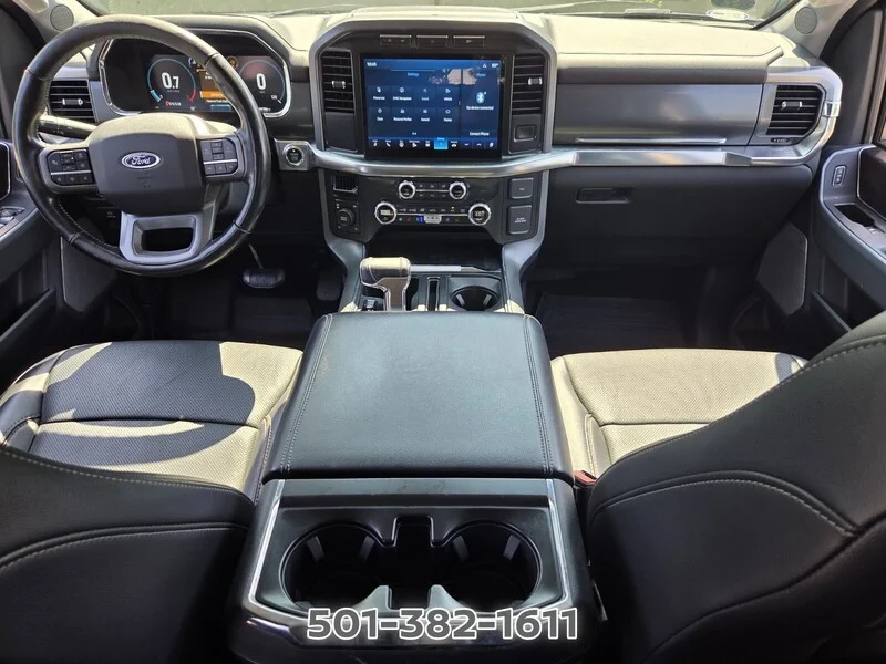 Used 2021 Black Metallic FORD LARIAT 4WD SUPERCREW 5.5