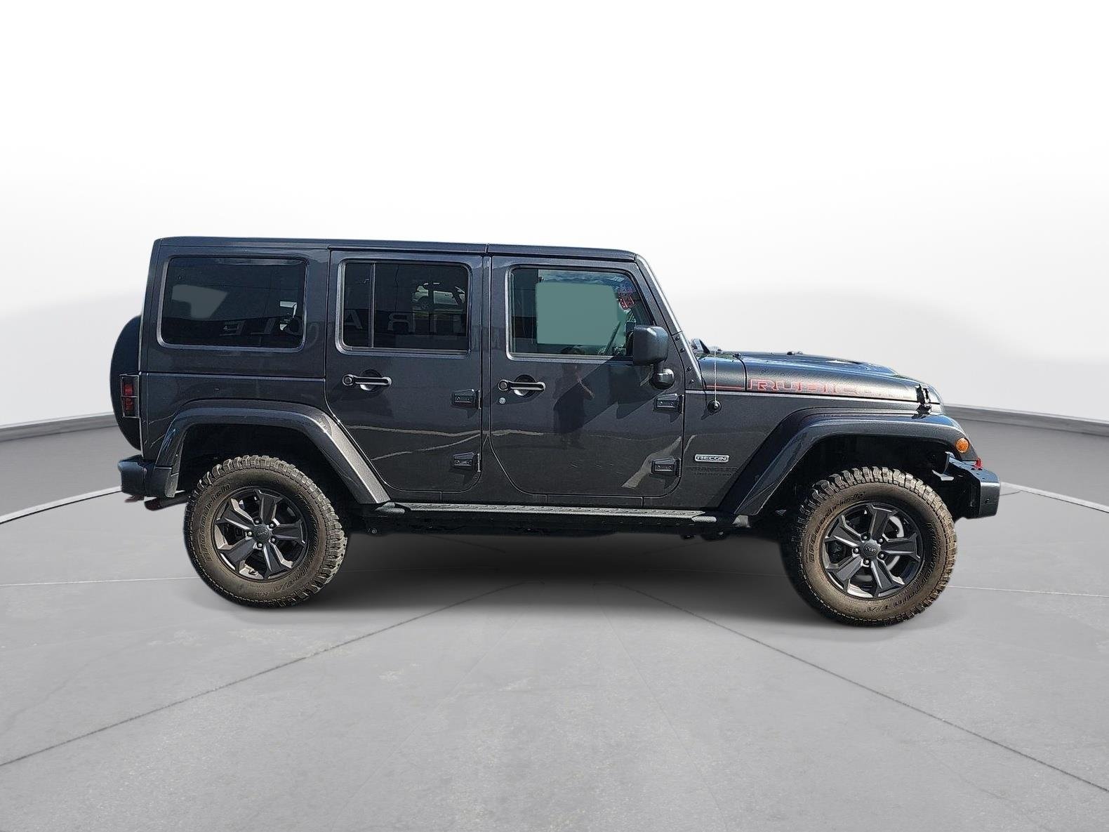 Used 2017 Granite Crystal Metallic Clearcoat Jeep Rubicon Recon image 4
