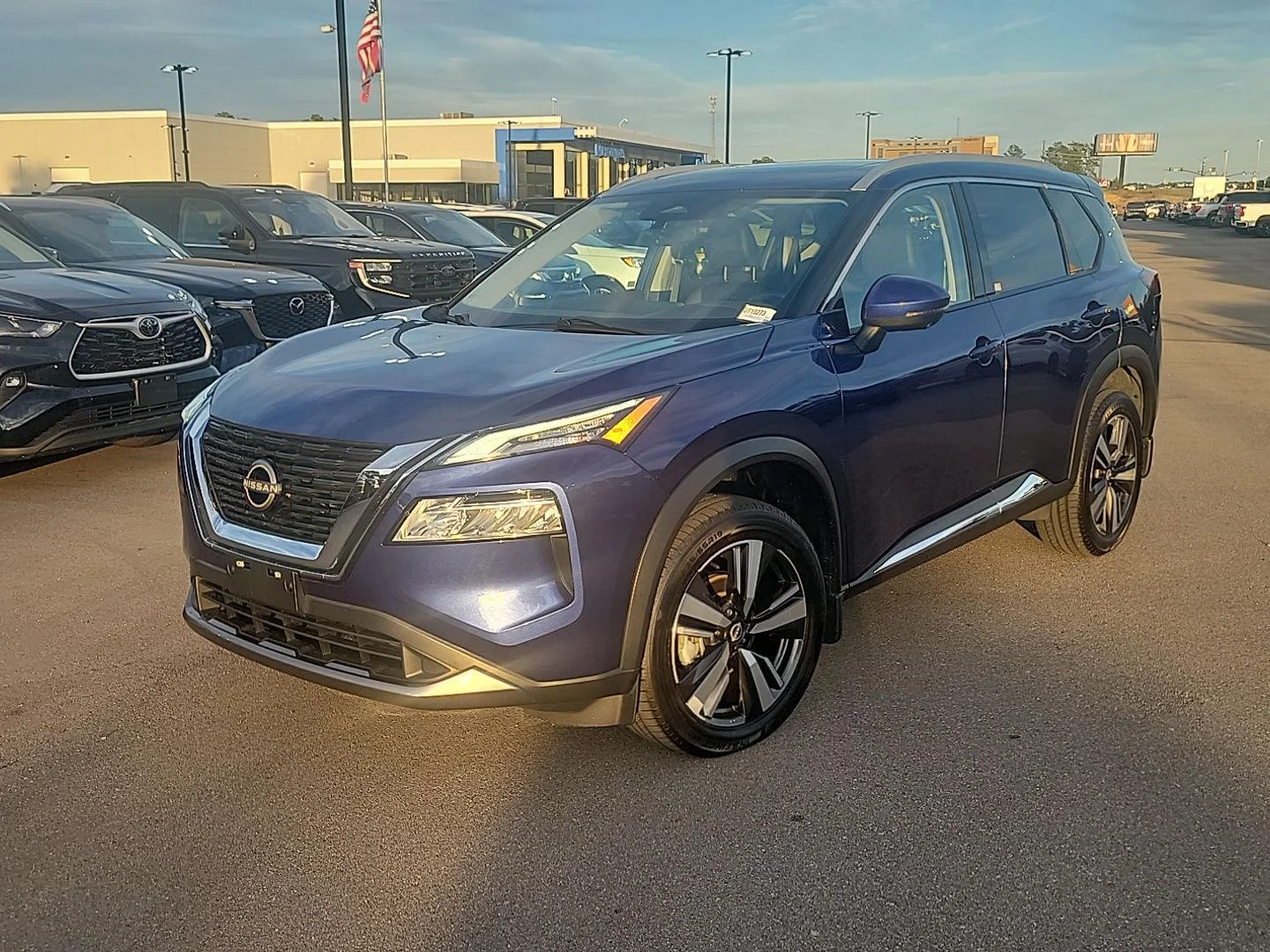 Used 2023 Caspian Blue Metallic Nissan SL image 1