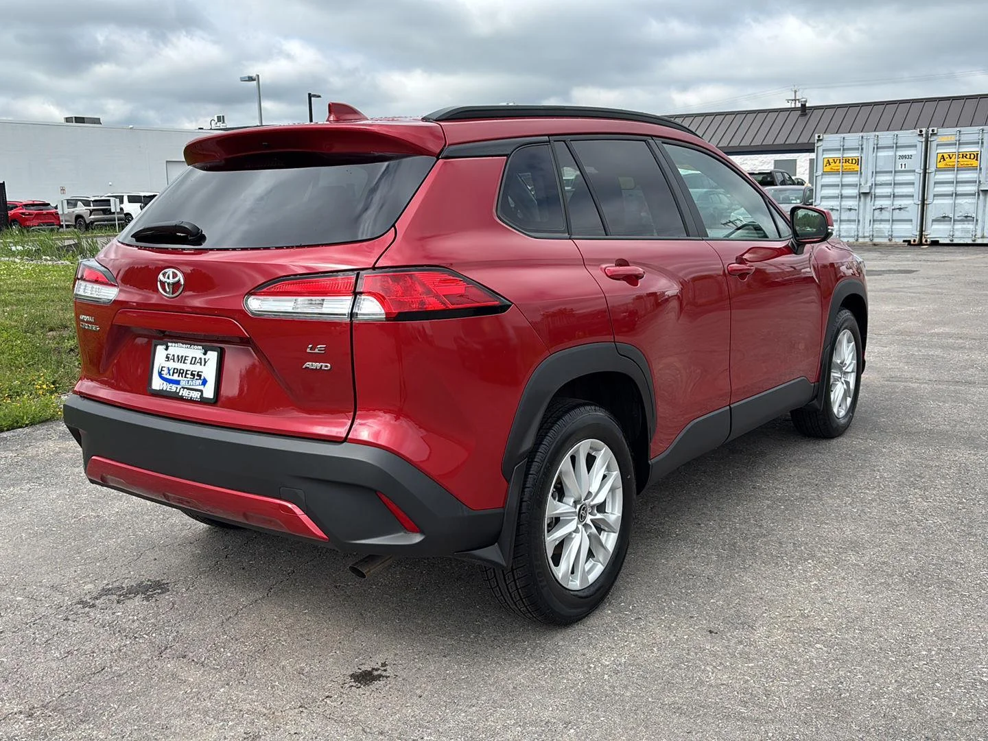 Used 2023 Barcelona Red Metallic Toyota LE image 7