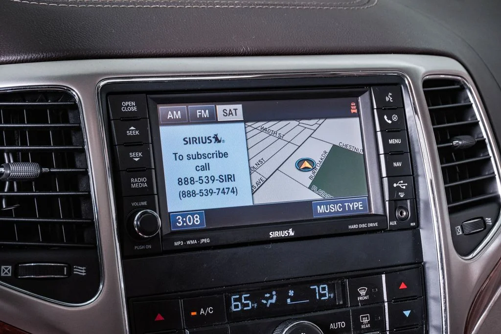 Used 2011 Bright Silver Metallic Jeep Overland image 22