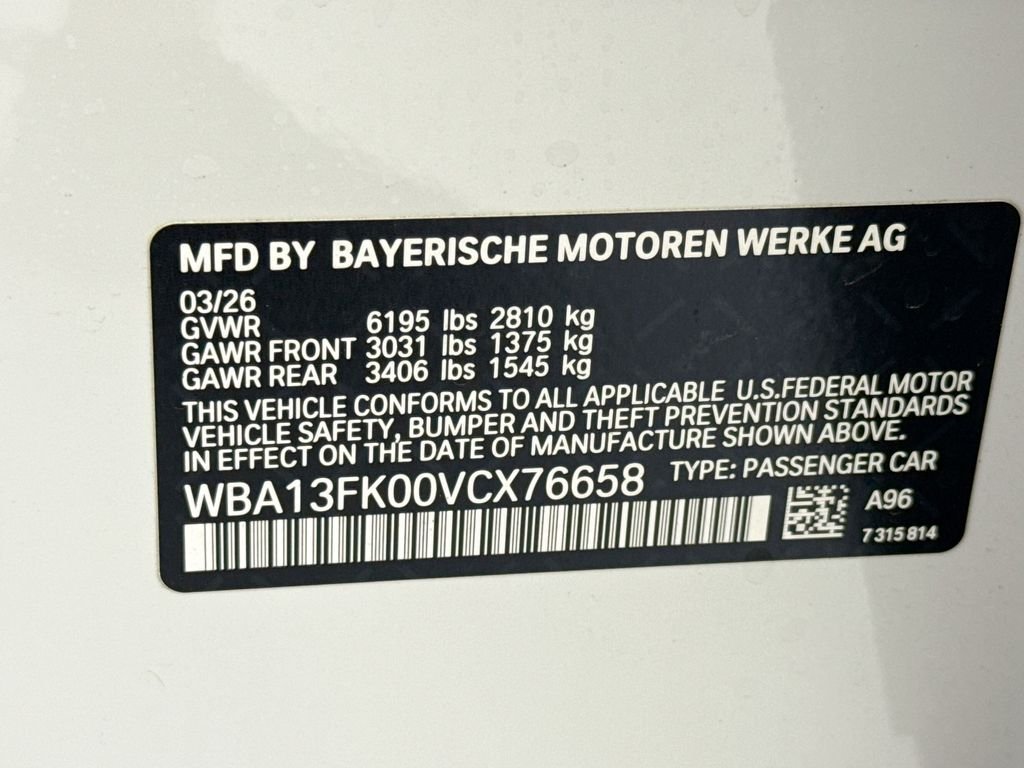 New 2027 White Metallic BMW 550e xDrive image 34
