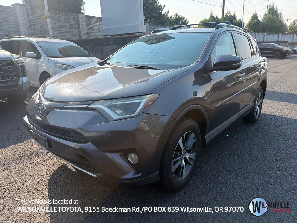 Used 2016 Gray Toyota XLE image 1