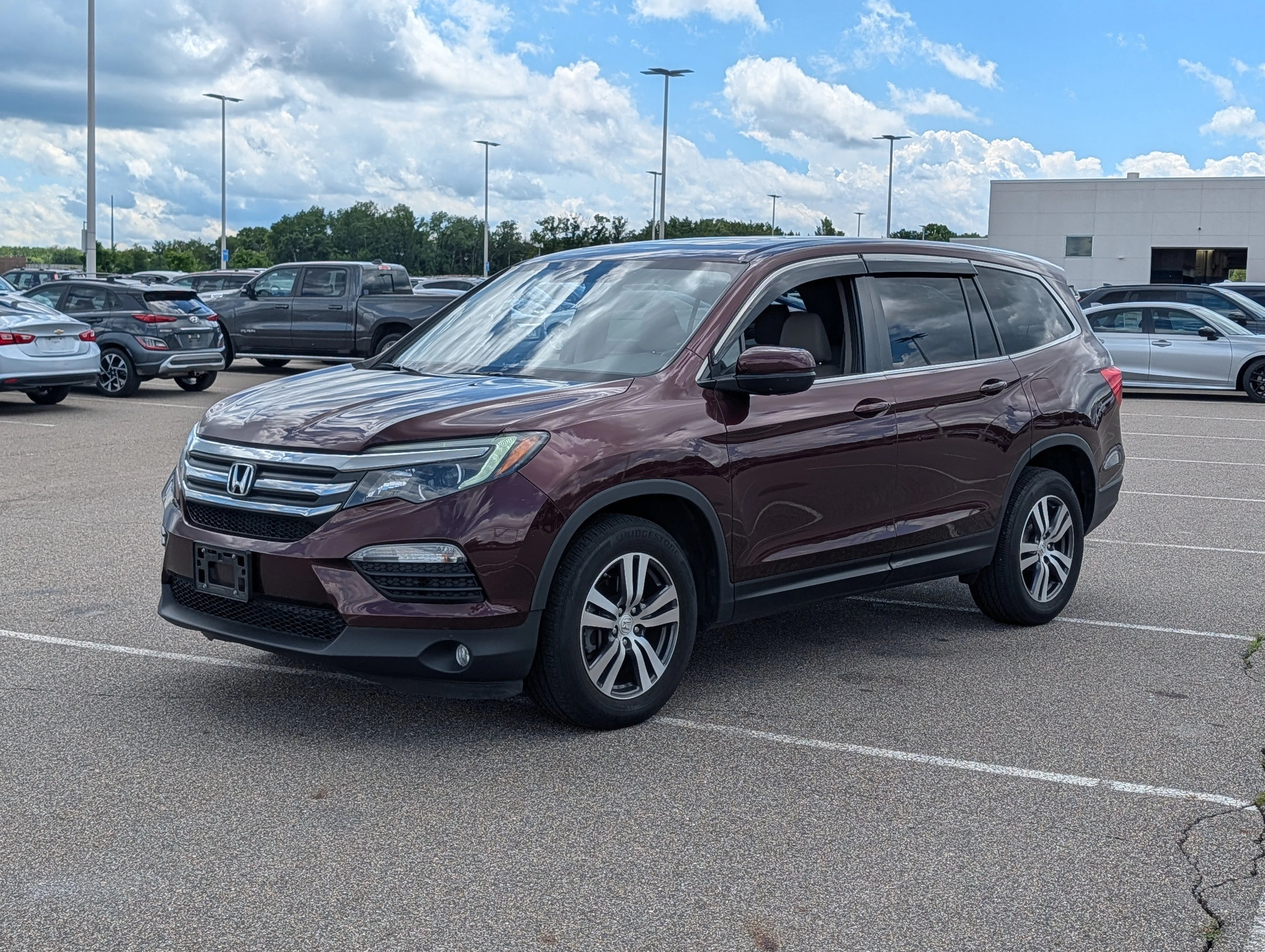 Used 2016 Honda Pilot EX-L with VIN 5FNYF6H77GB038097 for sale in Waite Park, Minnesota