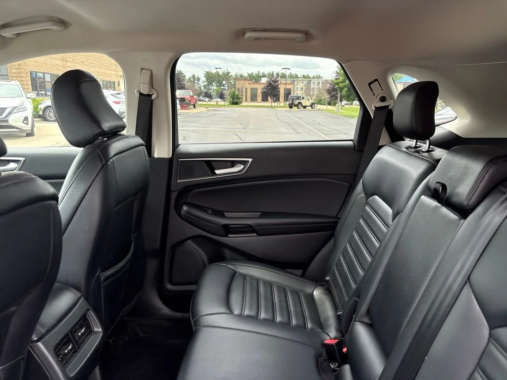 Used 2024 Agate Black Metallic Ford SEL image 24
