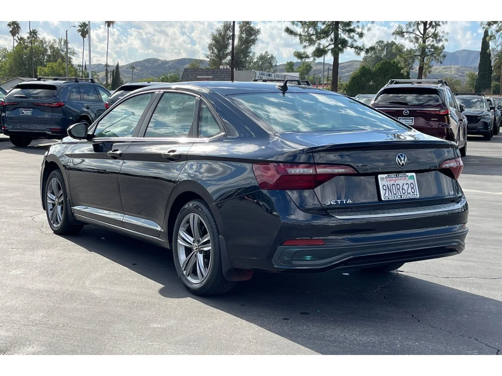Used 2023 Deep Black Pearl Volkswagen SE image 3