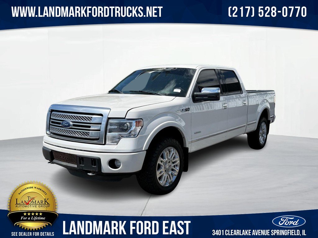 Used 2013 White Platinum Metallic Tri-Coat Ford 4WD SuperCrew 145" Platinum image 1