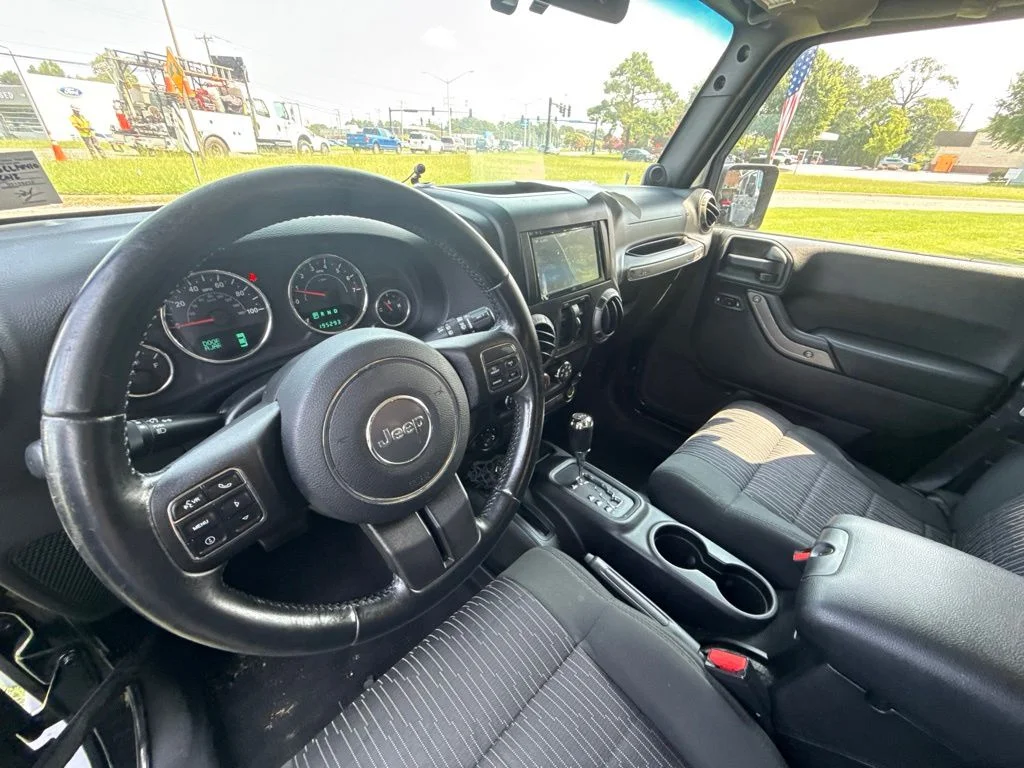 Used 2012 Black Jeep Unlimited Sport image 14
