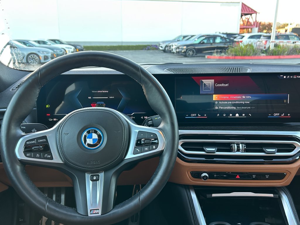 Certified Used 2024 Green Metallic BMW eDrive35 image 17