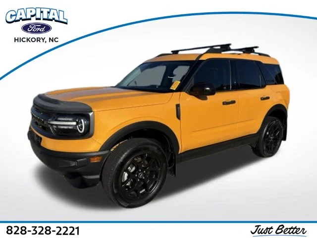 Used 2022 Orange Ford Big Bend image 1