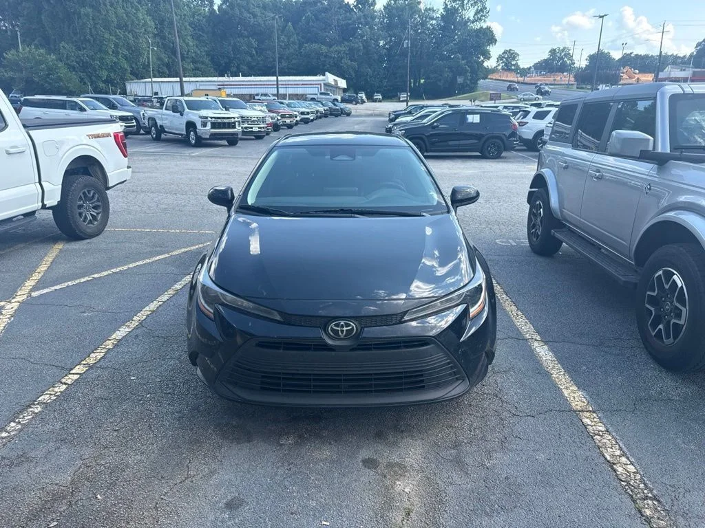 Used 2024 Black Toyota LE image 1