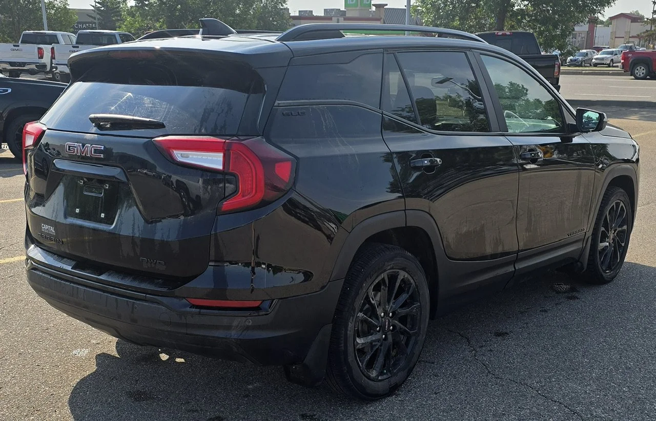 Used 2024 Black GMC SLE AWD image 5