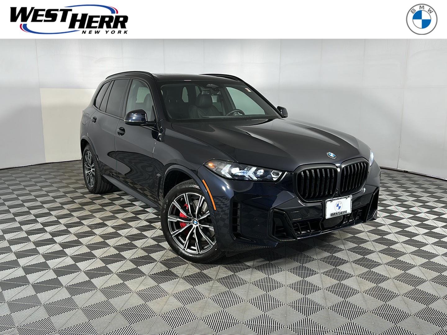 New 2026 Carbon Black Metallic BMW xDrive40i image 1