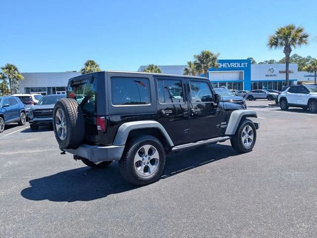 Used 2016 Black Clearcoat Jeep Sport image 3