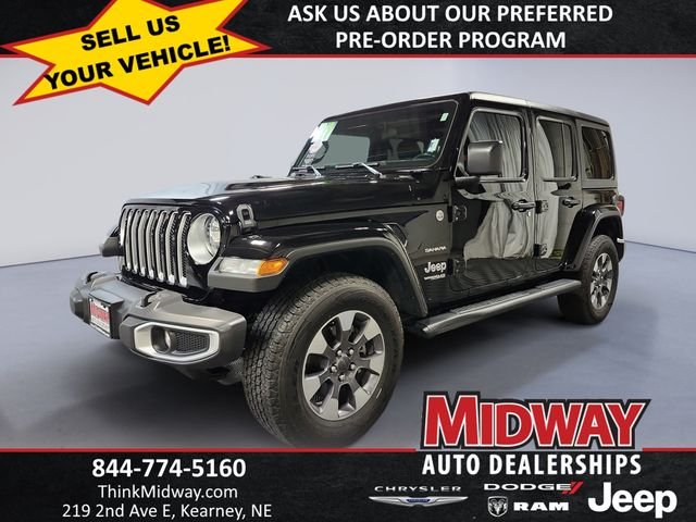 Used 2021 Black Jeep Unlimited Sahara image 1