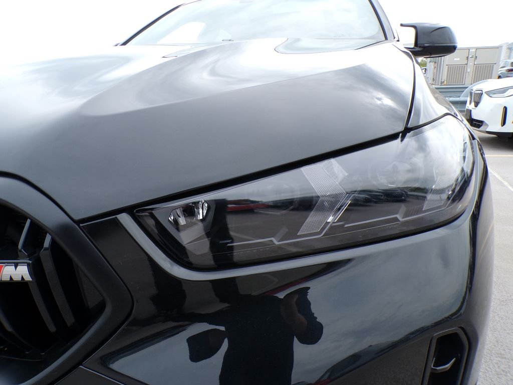 Certified Used 2024 Black Sapphire Metallic BMW M60i image 9