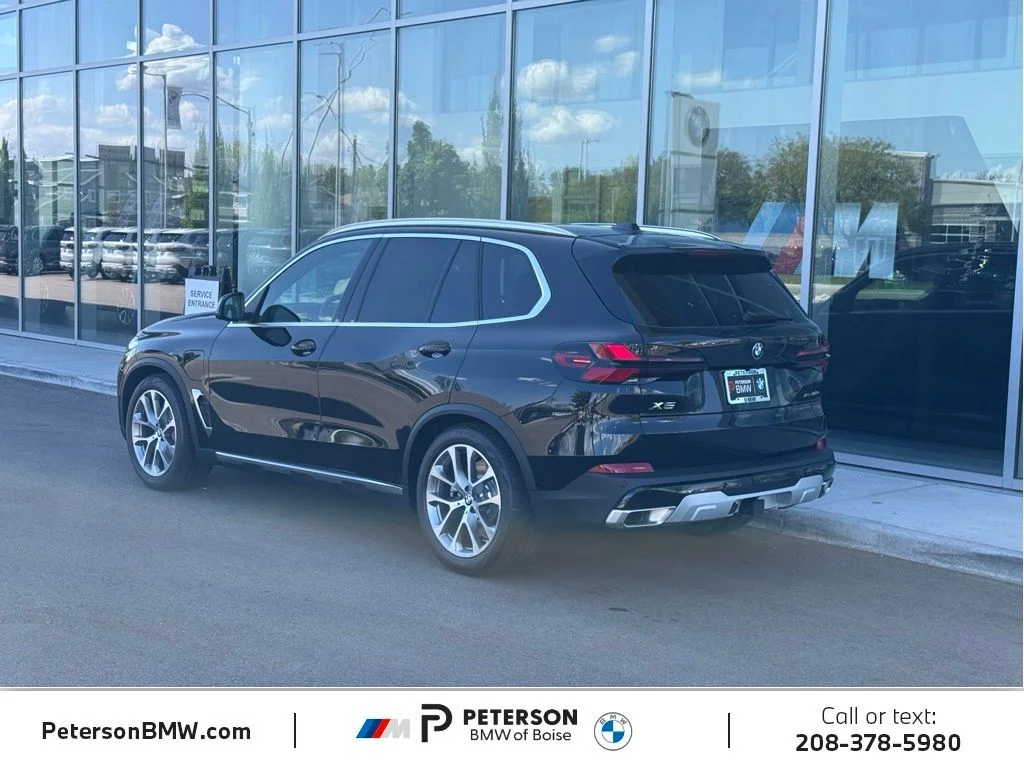 New 2026 Black BMW xDrive50e image 3