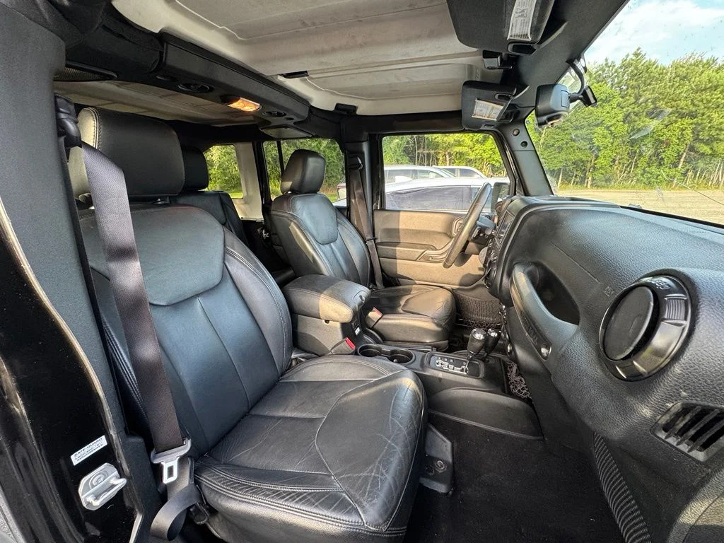 Used 2017 Black Jeep Unlimited Sahara image 12