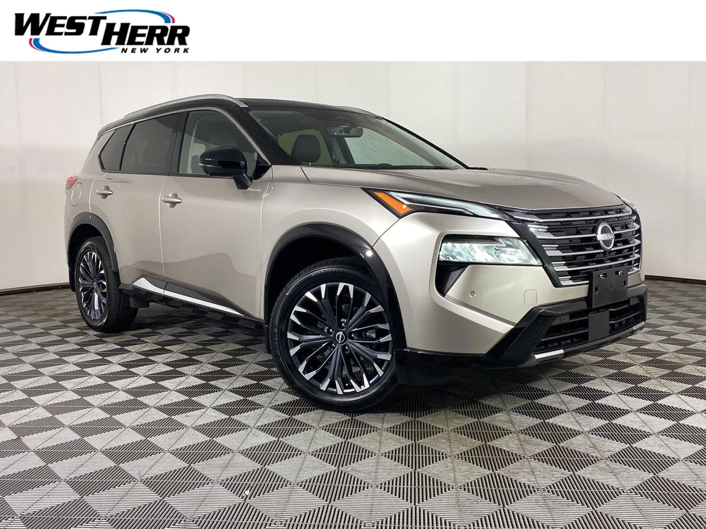 Used 2024 Champagne Silver Metallic/Super Black Nissan Platinum image 1