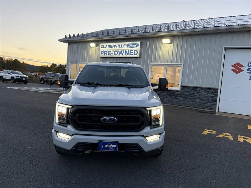 Used 2021 White Ford XLT Sport image 1