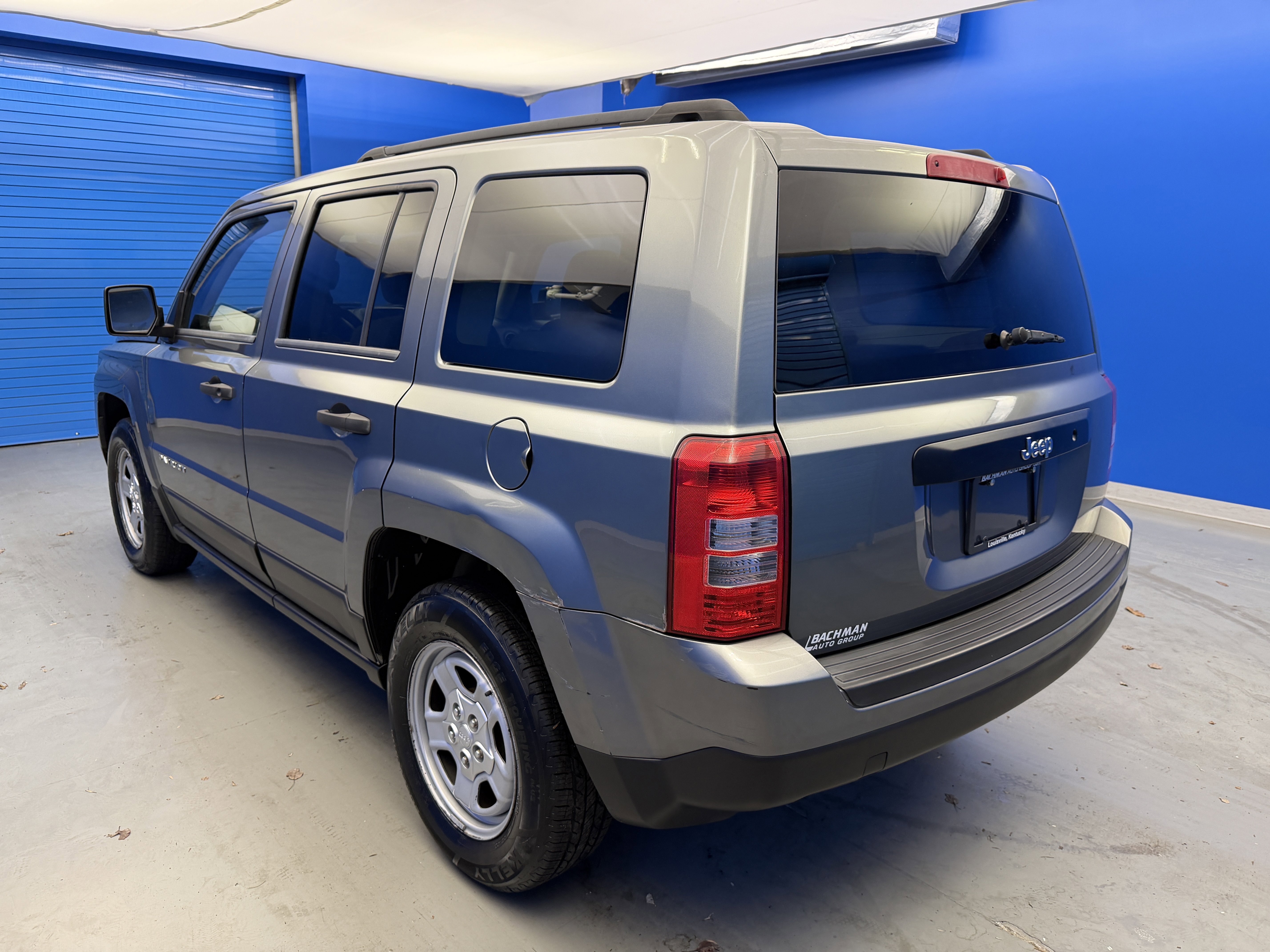 Used 2012 Mineral Gray Metallic Jeep Sport image 5