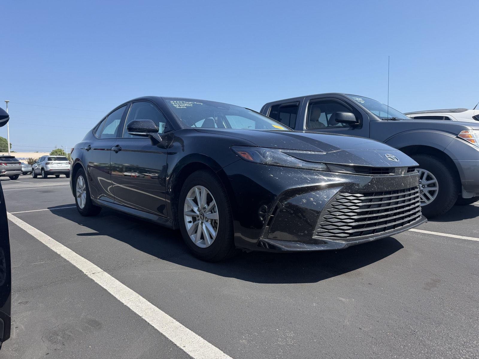 Used 2025 Midnight Black Metallic Toyota LE image 11