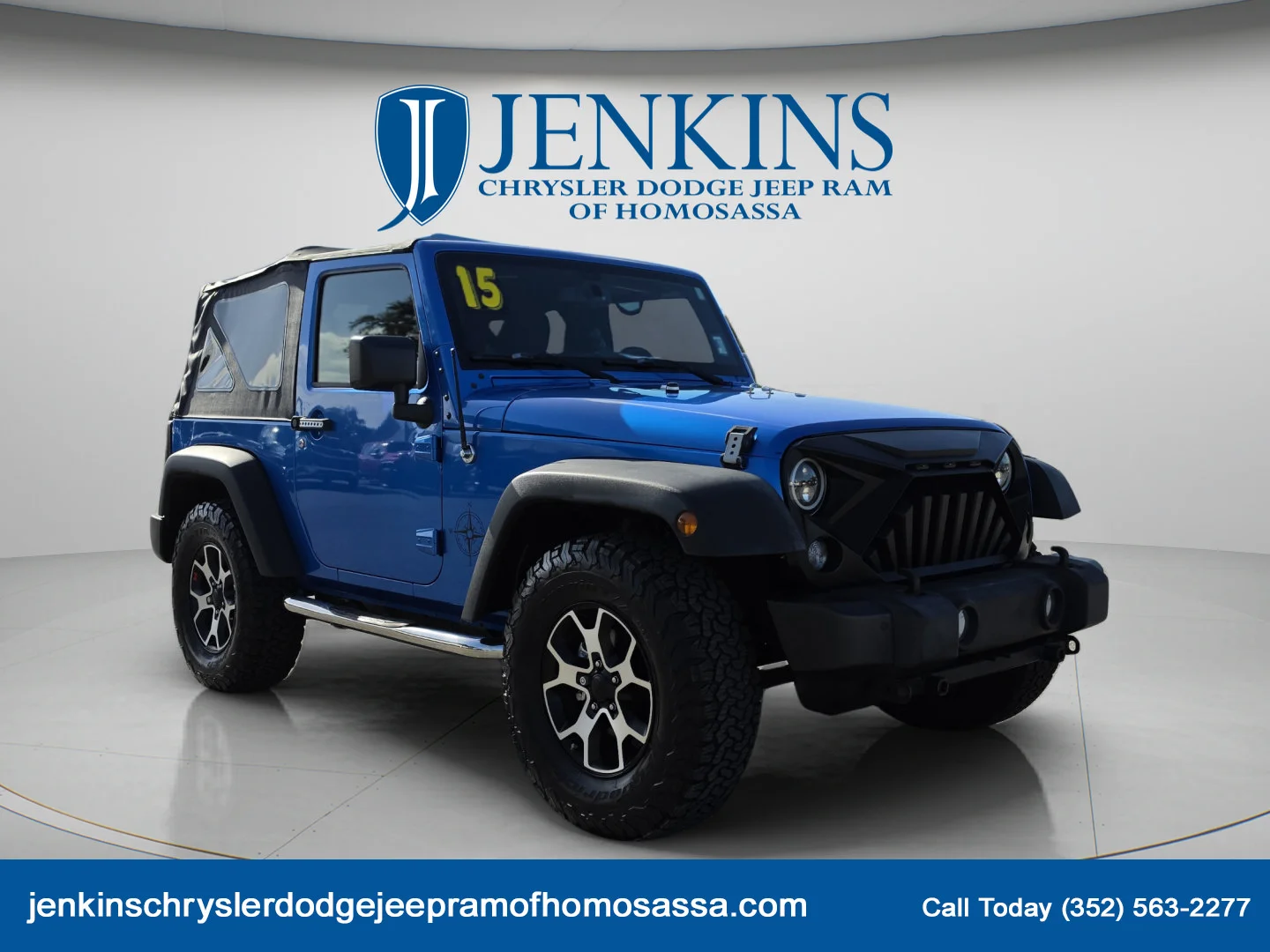 Used 2015 Hydro Blue Pearl Coat Jeep Sport image 1