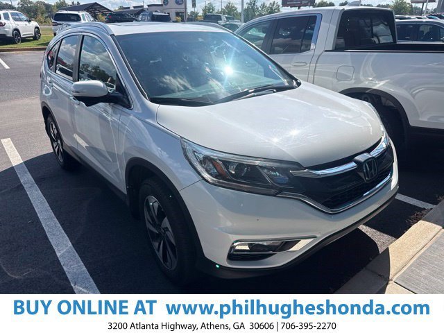 Used 2016 White Diamond Pearl Honda Touring image 1