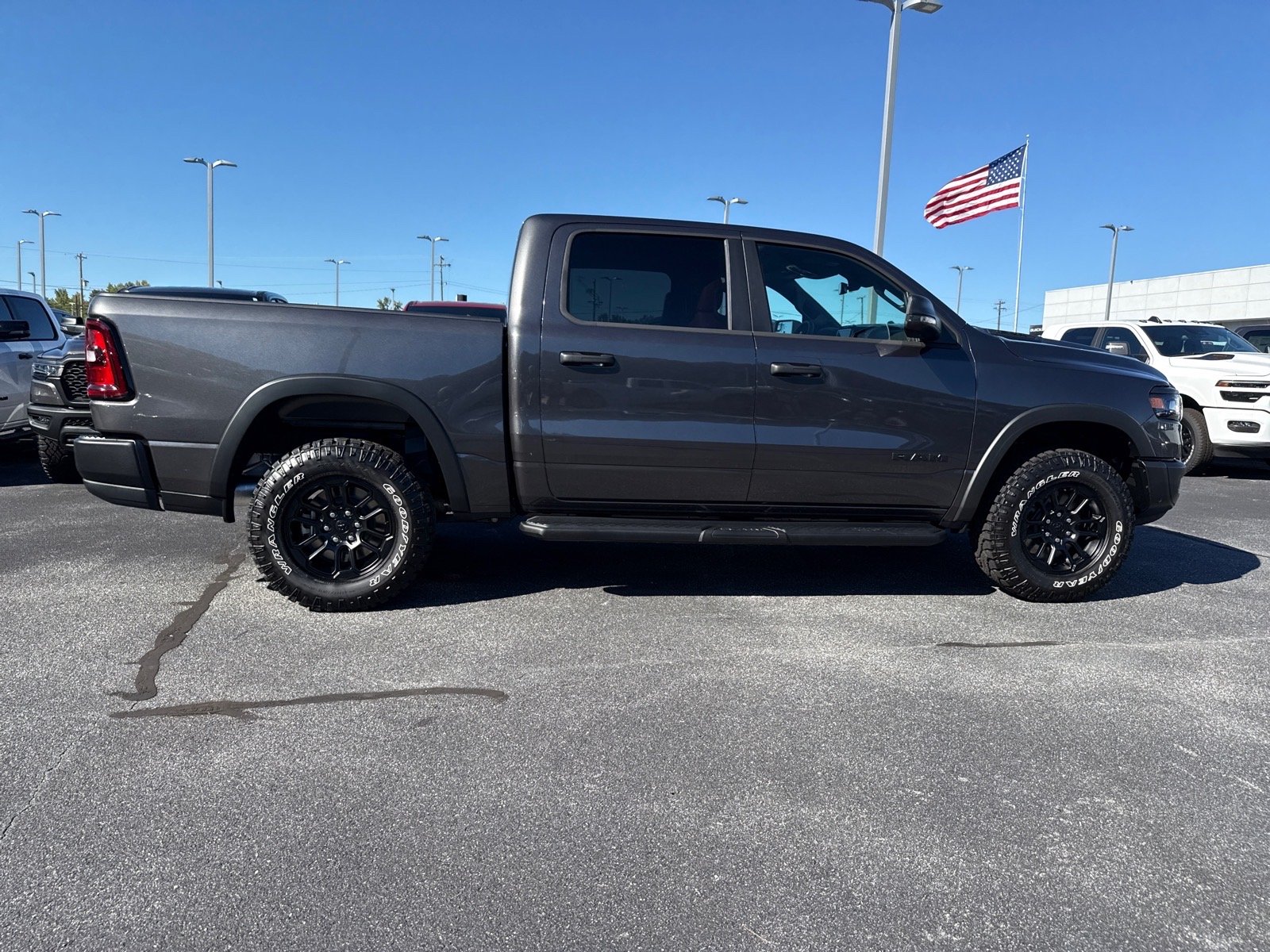 New 2026 Granite Crystal Metallic Clear-Coat Exterior Paint RAM Rebel Crew Cab 4x4 5