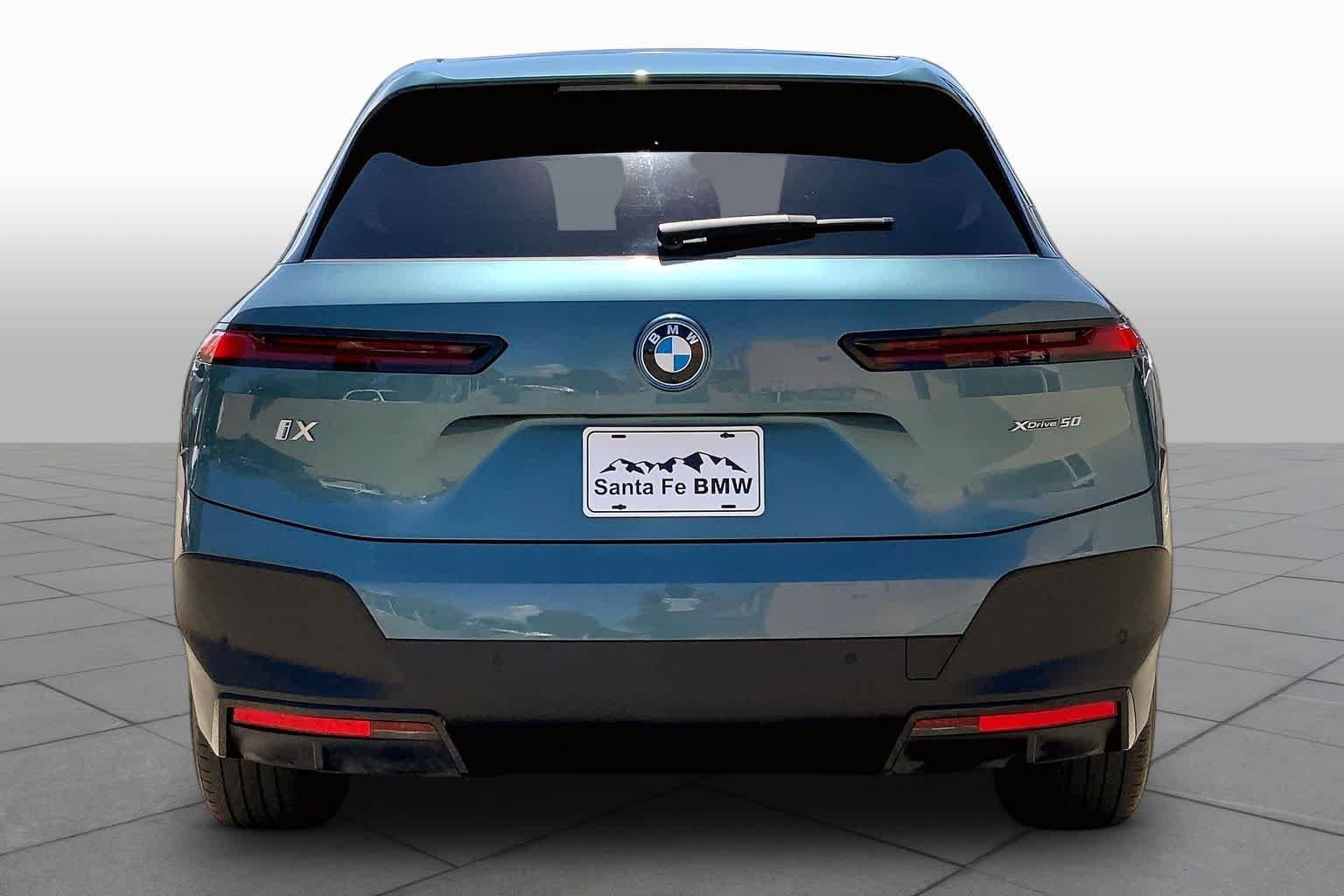 Used 2024 Blue Ridge Mountain Metallic BMW xDrive50 image 4