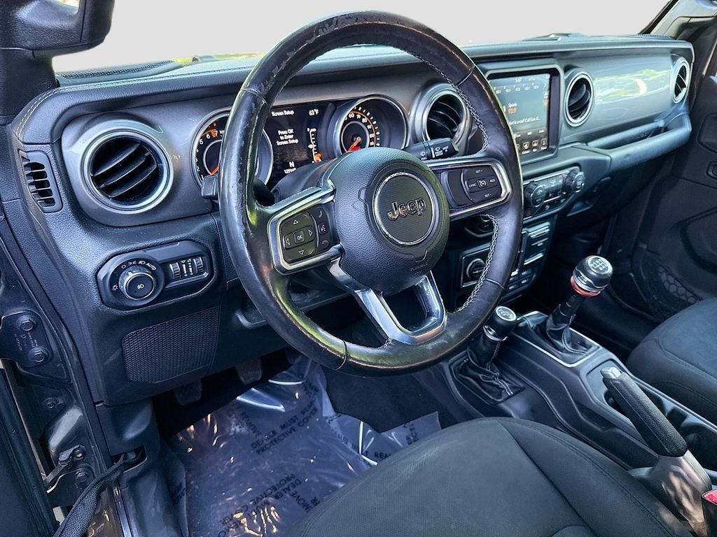 Used 2018 Granite Crystal Metallic Clearcoat Jeep Sahara image 9