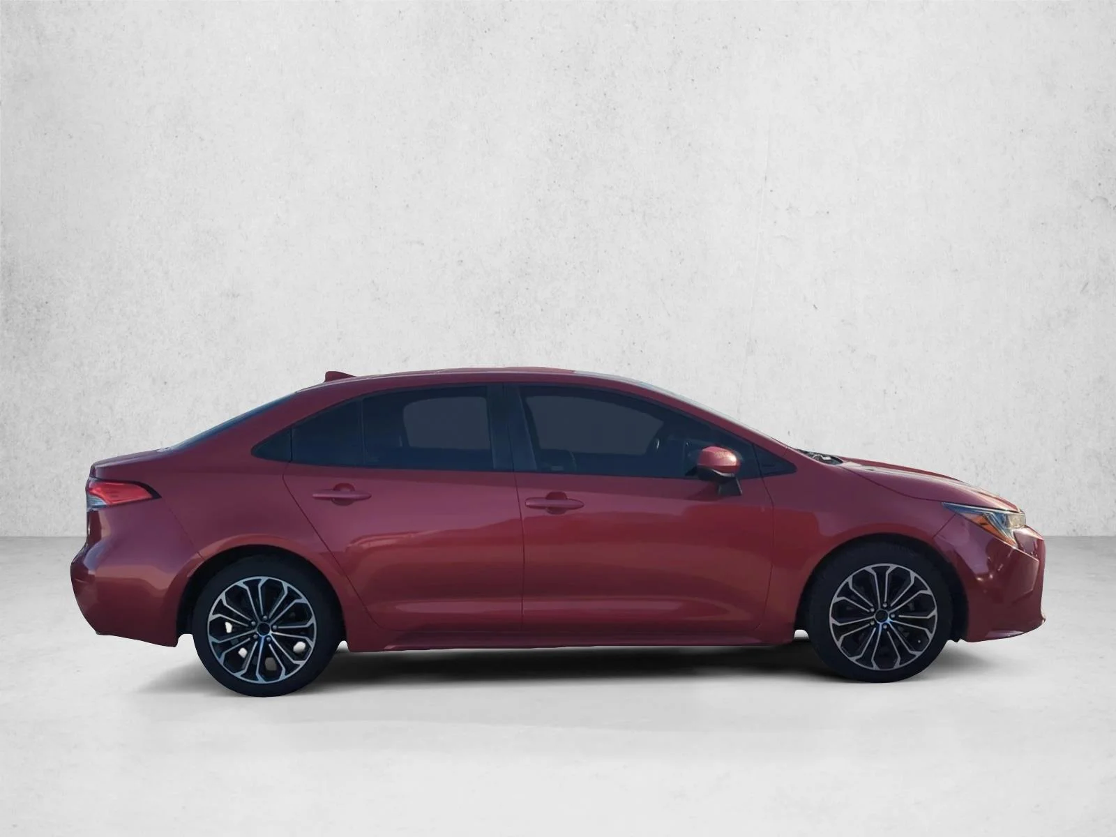 Used 2020 Barcelona Red Metallic Toyota LE image 4